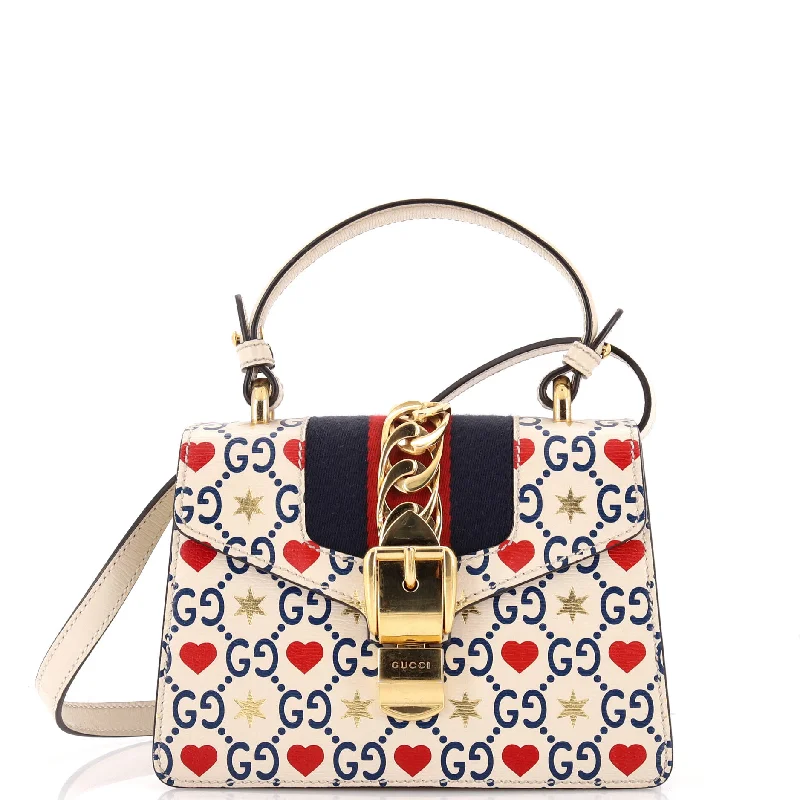 Shoulder bags with leather accents for elegance -Sylvie Top Handle Bag Limited Edition Valentines GG Printed Leather Mini