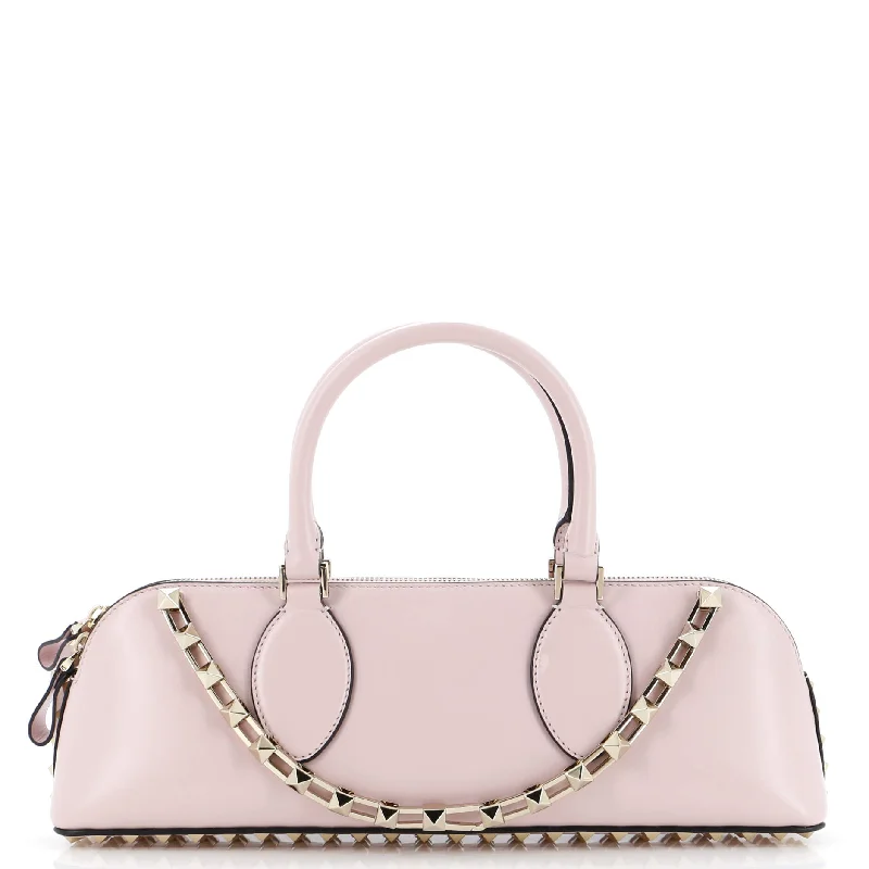 Shoulder bags with playful pom-poms for charm -Rockstud Zip Up Top Handle Bag Leather East West