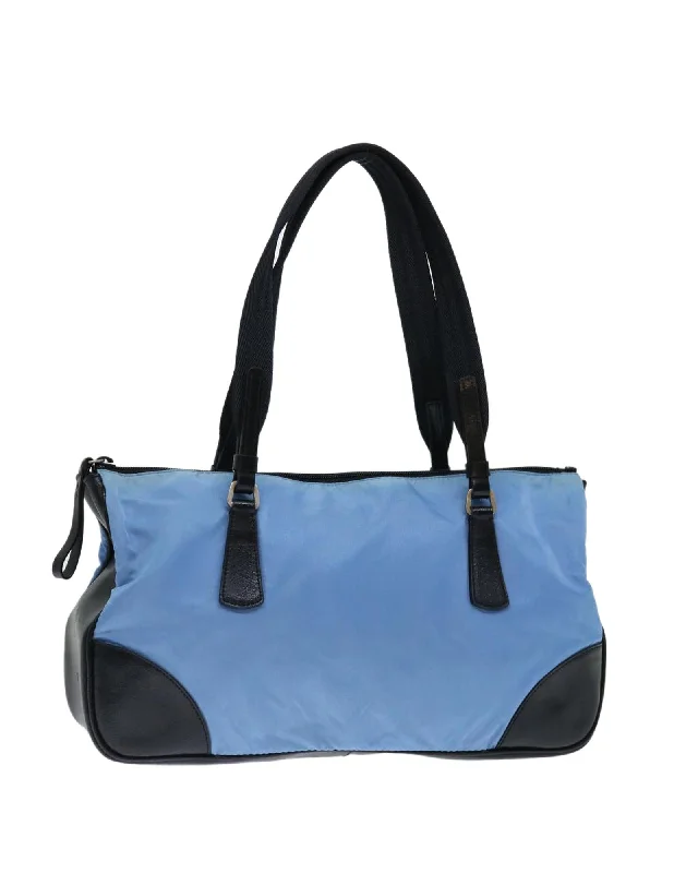 Tote bags with animal motif designs for a quirky and playful touch-Blue and Black Nylon Shoulder Bag