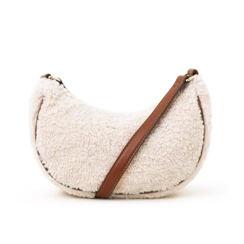 Handle bags with soft linings for protection -Accessorize London Women's Cream Shearling Sling Bag