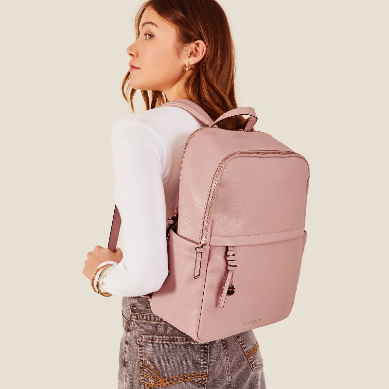 Handle bags with polka dots for fun -Accessorize London Women's Zip Around Backpack-Light Pink