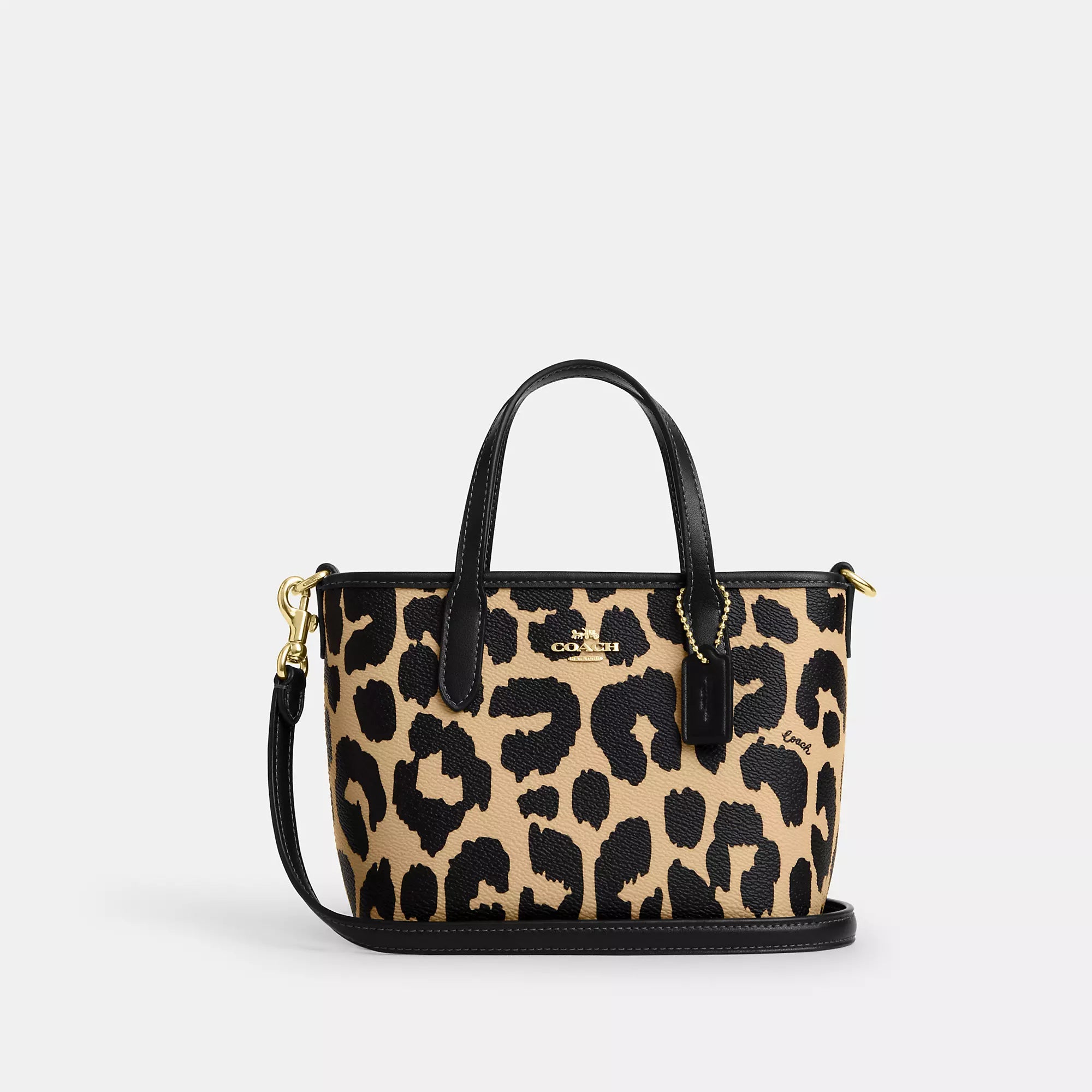 Small handle bags perfect for quick trips -Coach Outlet City Mini Tote Bag With Leopard Print