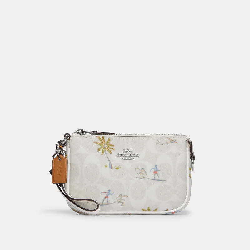 Handle bags with floral prints for spring -Coach Outlet Nolita 15 In Signature Canvas With Hula Print