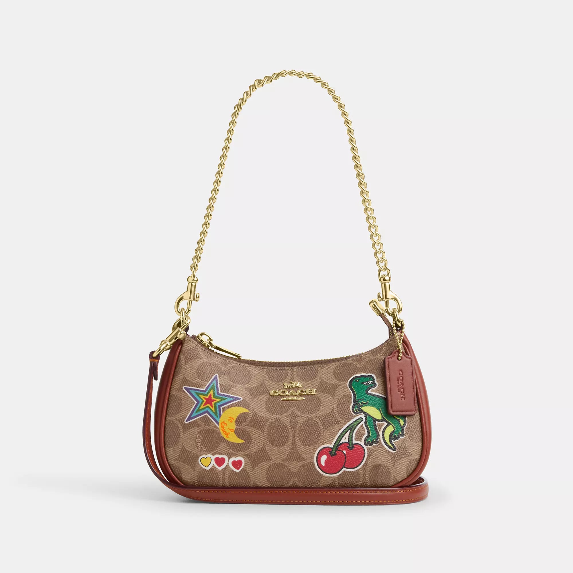 Handle bags with perforated details for style -Coach Outlet Teri Mini Crossbody Bag In Signature Canvas With Sticker Print