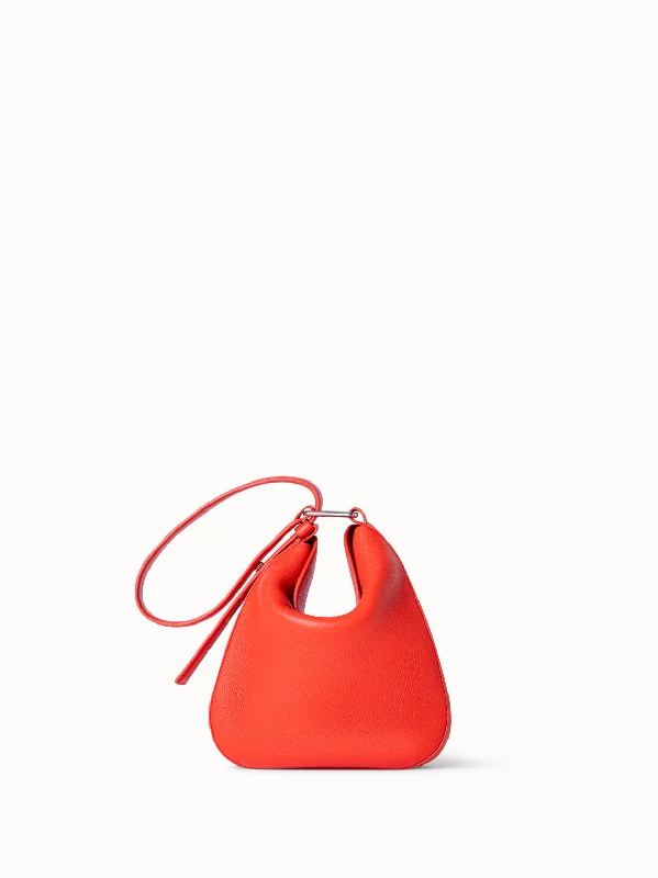 Handle bags with vibrant colors for boldness -Anna Little Hobo