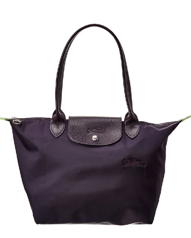 Handle bags with thick handles for support -Longchamp Le Pliage Green Medium Canvas & Leather Tote