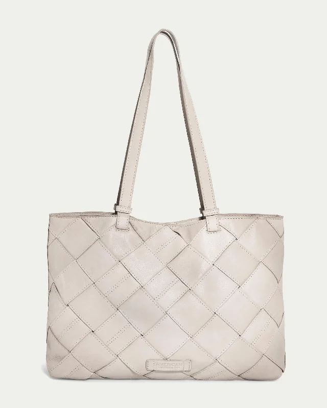 Handle bags with floral prints for spring -Mercer Woven Tote