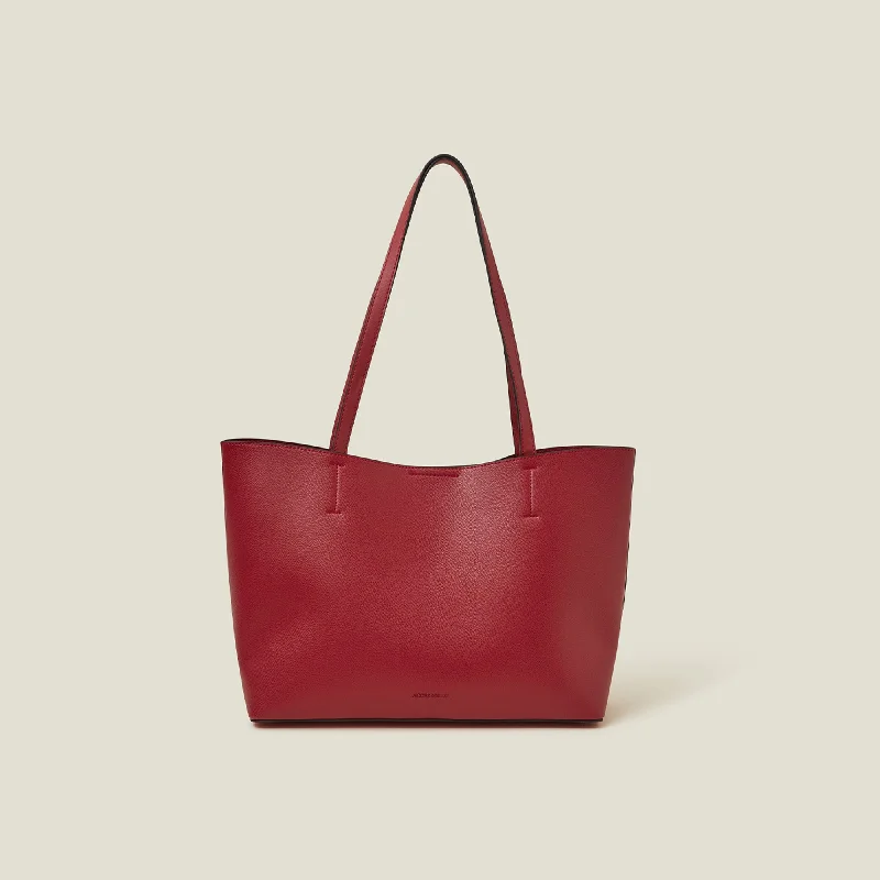 Handle bags with modern cutouts for style -Red Faux Leather Tote Bag